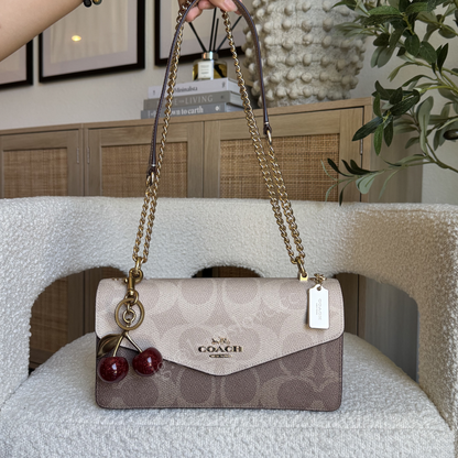 Klare Envelope Crossbody Bag In Blocked Signature Canvas